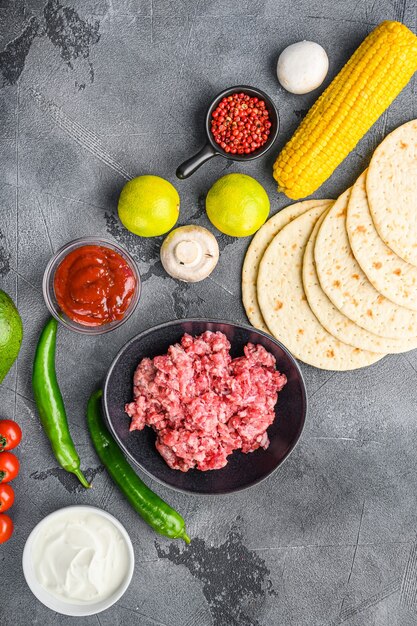 Traditional homemade taco ingredients with meat