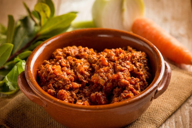 Traditional homemade veal ragout with ingredients