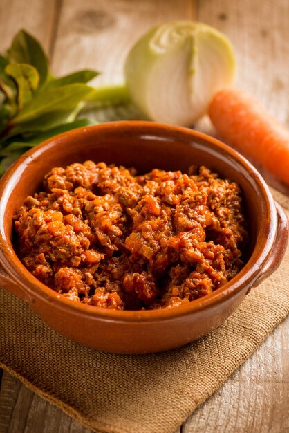 Traditional homemade veal ragout with ingredients