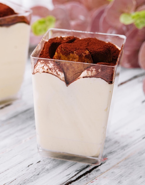 Traditional italian dessert tiramisu in a glass