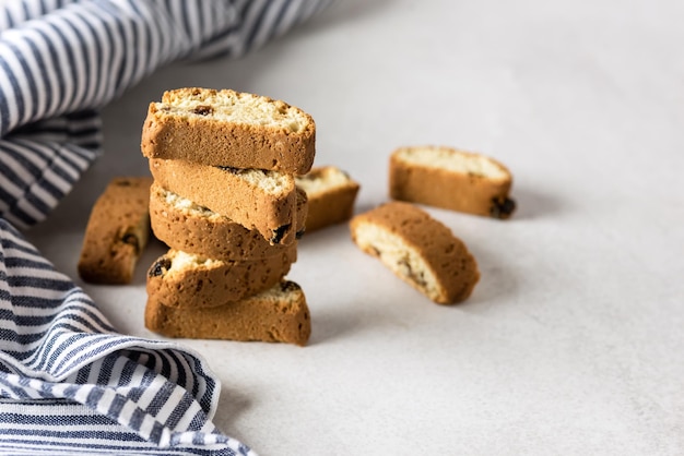 Traditional Italian Dry Cookies Biscuits Biscotti Cantuccini Biscotti di Prat Blue Napkin Copy Space