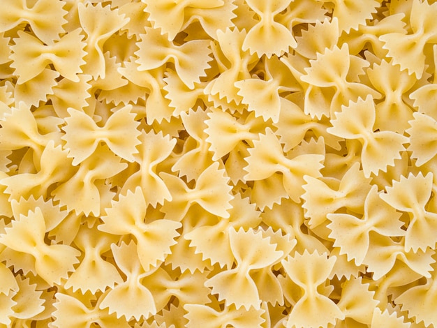 Traditional italian farfalle pasta as background