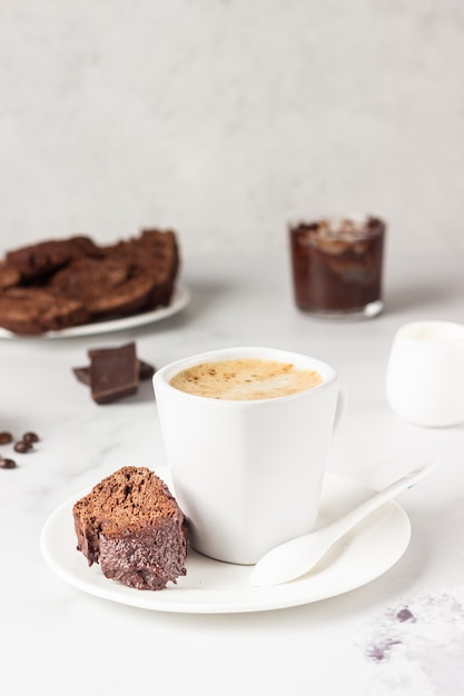 Traditional Italian homemade biscotti with chocolate on a light grey surface