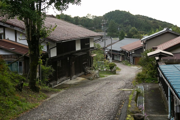 Traditional japanese houses on the Nakasendo trail between Tsumago and Magome in Kiso Valley Japan