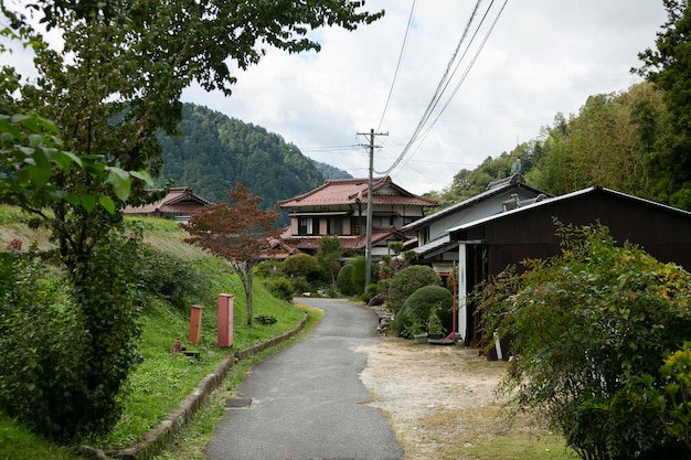 Photo traditional japanese houses on the nakasendo trail between tsumago and magome in kiso valley japan