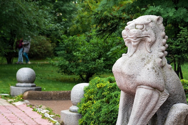 Traditional Japanese statue of a stone lion at the entrance to the Sakhalin Museum of Local Lore