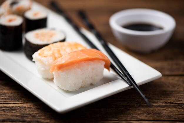 Traditional Japanese sushi on a plate close up