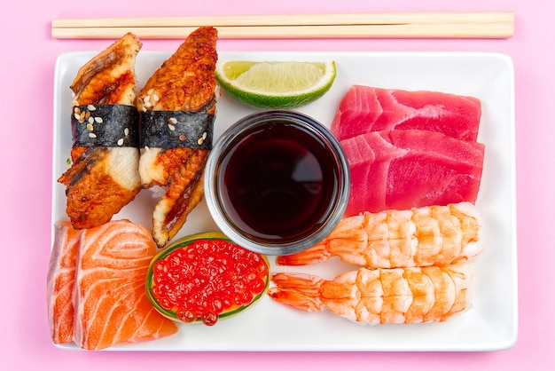 Traditional japanese sushi set on a white plate