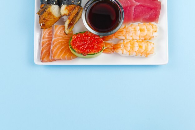 Traditional japanese sushi set on a white plate