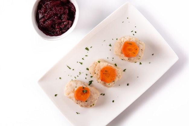 Traditional Jewish gefilte fish isolated on white background