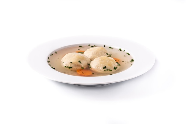 Traditional Jewish matzah ball soup isolated on white background