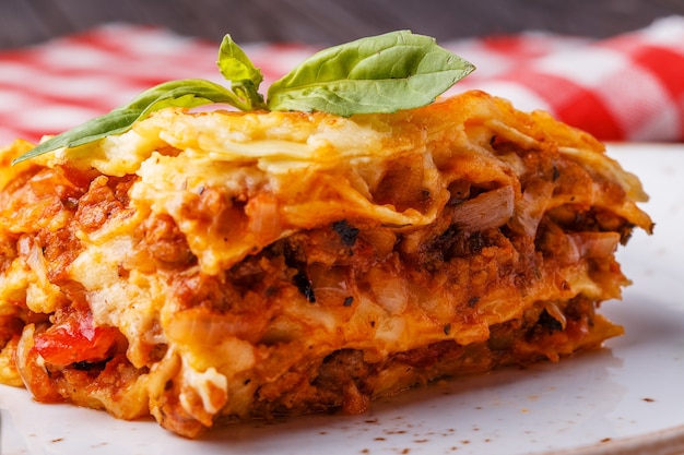 Traditional lasagna made with minced beef bolognese sauce and bechamel sauce