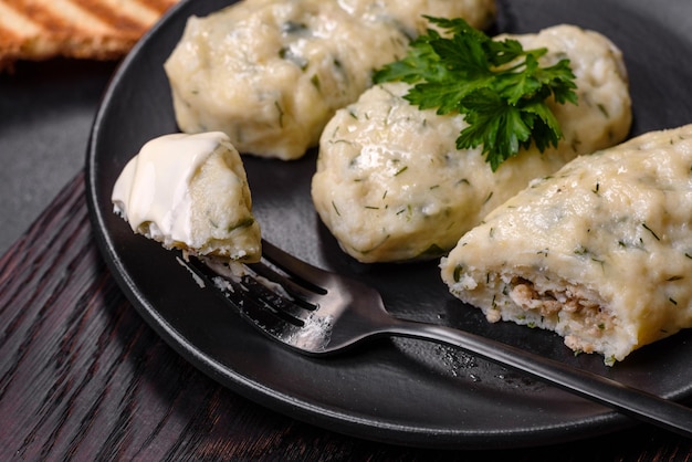 Traditional Lithuanian dish zeppelin boiled potato dumplings stuffed with minced meat