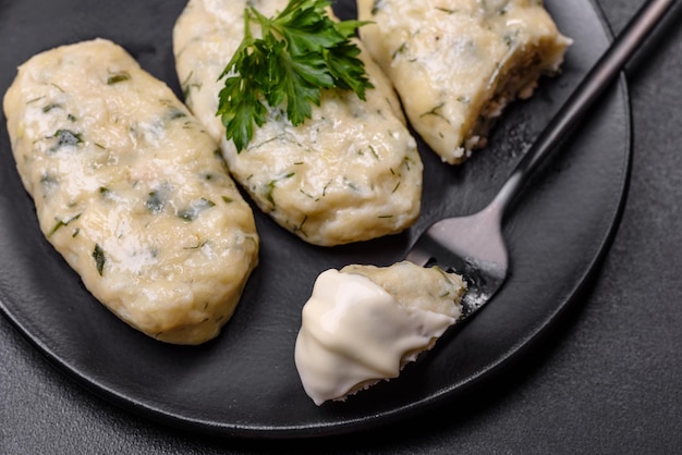 Traditional Lithuanian dish zeppelin boiled potato dumplings stuffed with minced meat