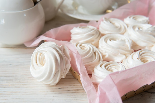 Traditional marshmallows on a plate on the kitchen table