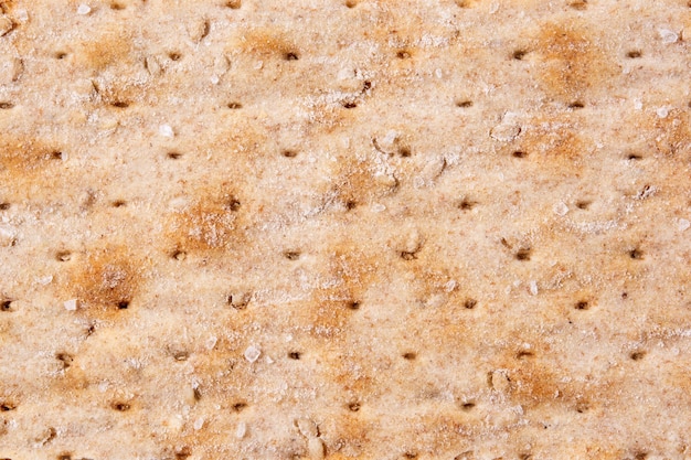 Photo traditional matzah bread pattern and heart shaped matzah