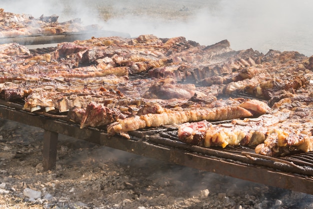 Traditional meat grilled on the grill in the Argentine countryside