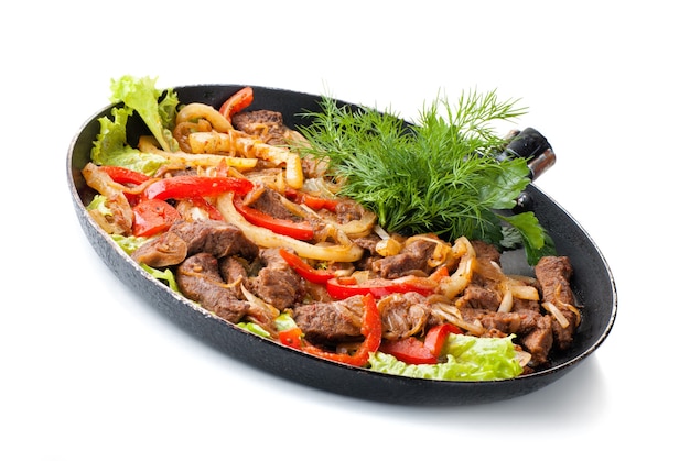 Traditional mexican beef fajitas on white background