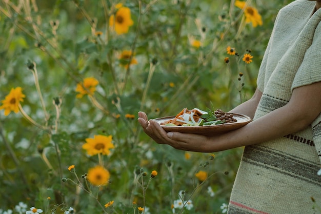 Traditional Mexican chilaquiles recipe with red sauce green chile epazote onion and beans