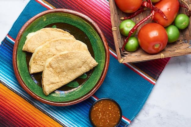 Traditional Mexican food corn tortilla quesadillas stuffed with cheese