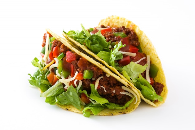 Traditional Mexican tacos with meat and vegetables isolated on white