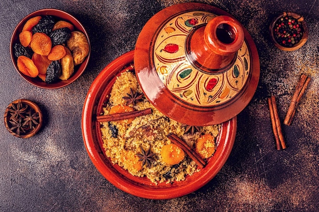 Traditional moroccan tajine of chicken with dried fruits and spices