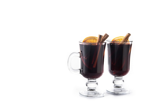 Traditional mulled wine with spices isolated on white