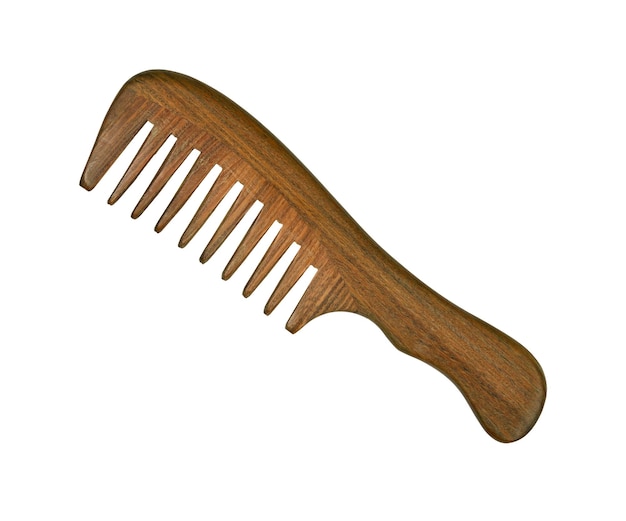 Photo traditional natural wooden hair comb isolated