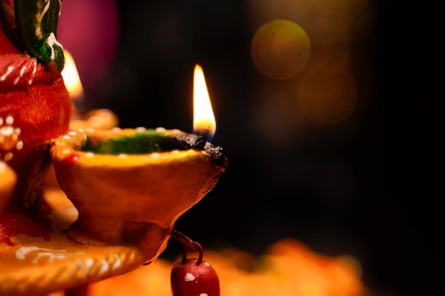 Traditional oil lamps with flower decoration for indian festival diwali.