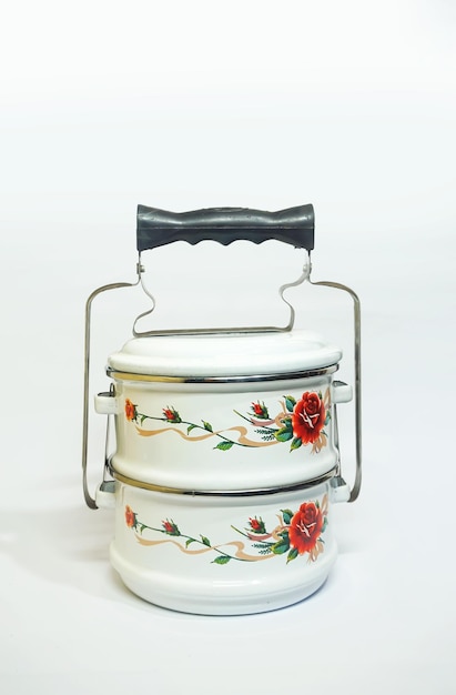 Photo traditional old classic steel made food container. rantang