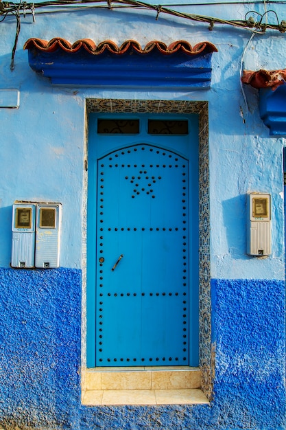 Traditional oriental doors with ornament in Morocco.