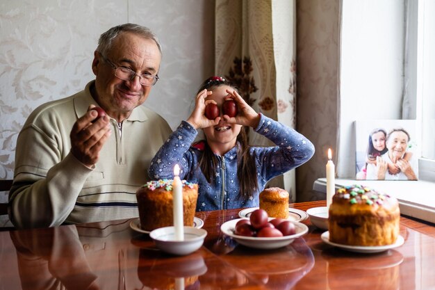 Traditional orthodox easter food: easter bread, cheese cake\
paskha, painted eggs.