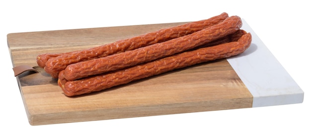Photo traditional polish thin smoked sausages on a white isolated background