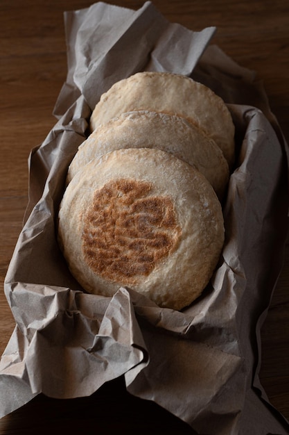 Traditional Portuguese bread Bolo Do Caco in craft paper