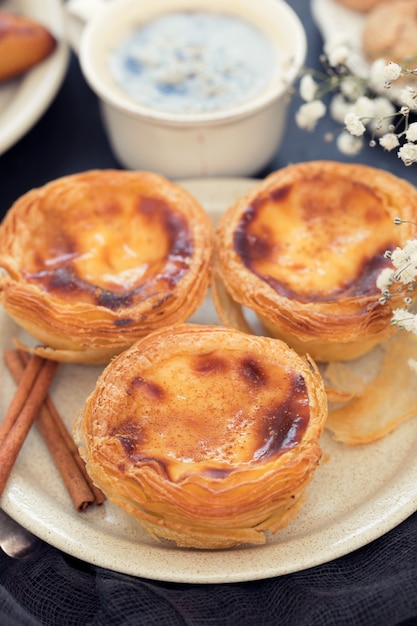 Traditional portuguese dessert on white plate pastel de nata