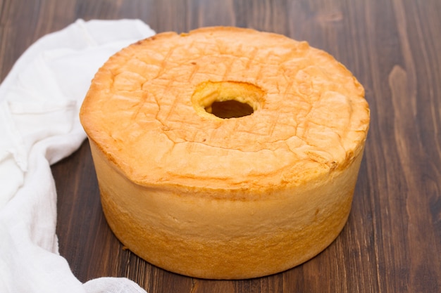 Traditional portuguese spongecake on wooden surface