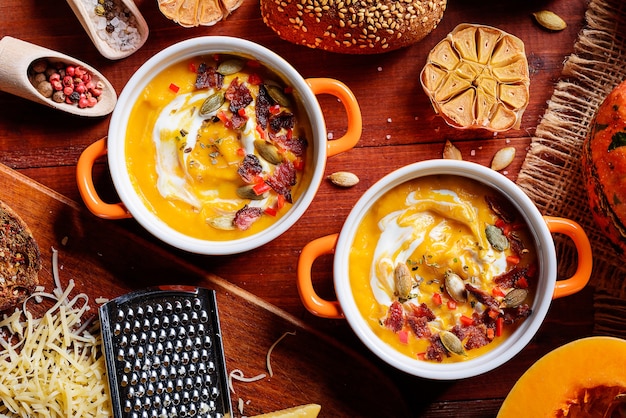 Traditional pumpkin cream soup in a rustic style. healthy eating concept.