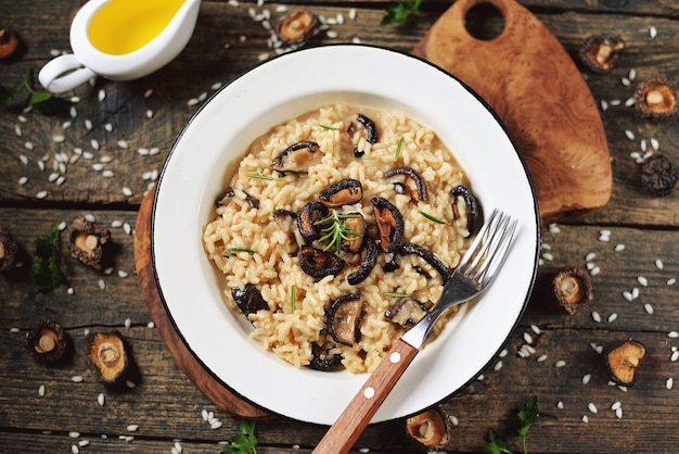 Traditional risotto with mushrooms, parmesan cheese, and vegetables