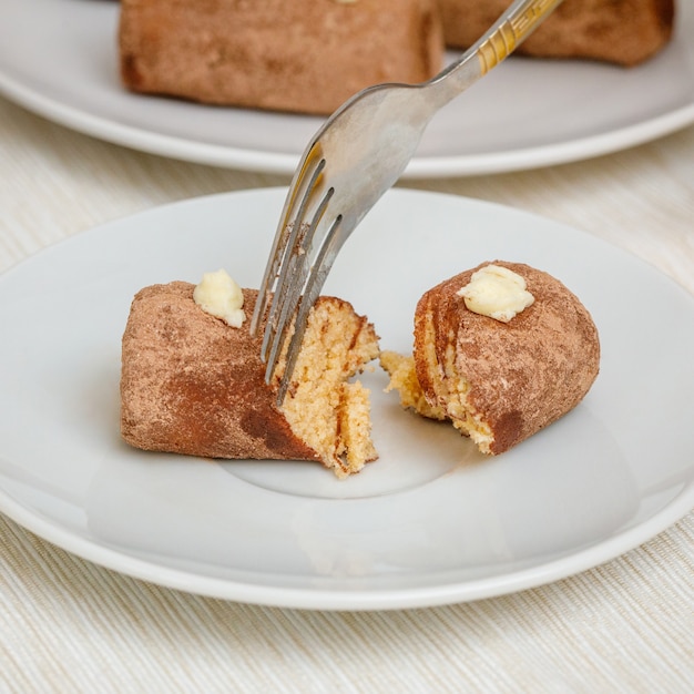 Photo traditional russian cake, rum balls as a potato form, closeup