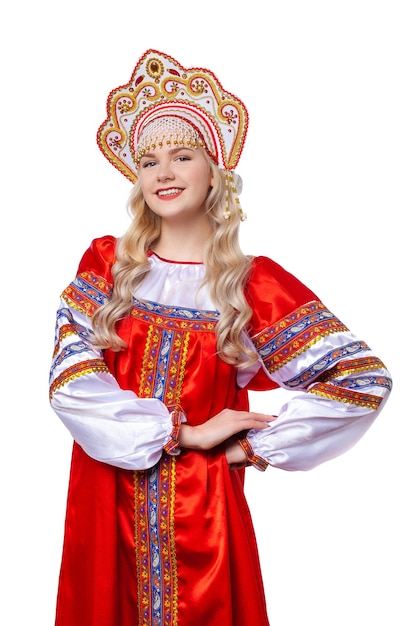 Photo traditional russian folk costume portrait of a young beautiful blonde girl in red dress