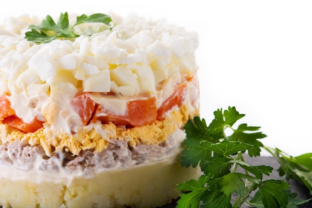 Traditional Russian layered salad Mimosa