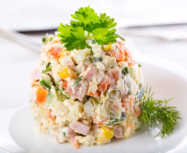 Traditional russian salad on a plate