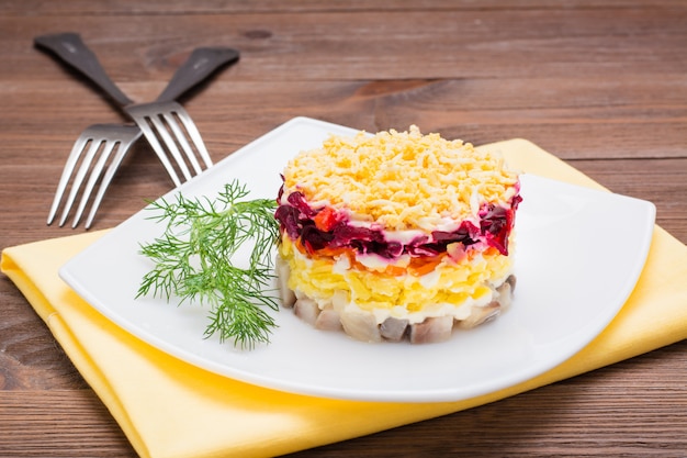 Traditional Russian salad with herring