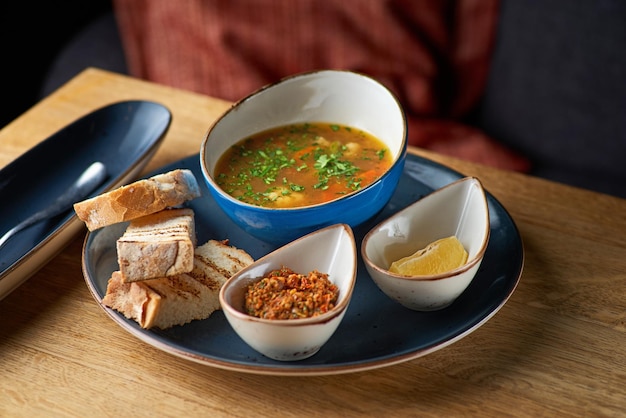 Traditional Russian Ukrainian vegetable borscht soup National slavic food on the table serving in a restaurant menu food concept