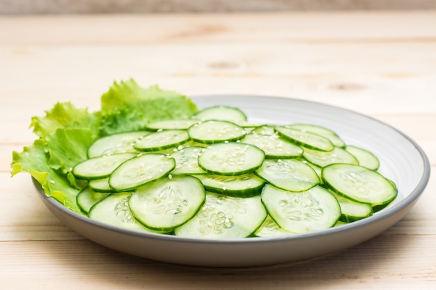 Traditional salad of slices of cucumber and sesame seeds