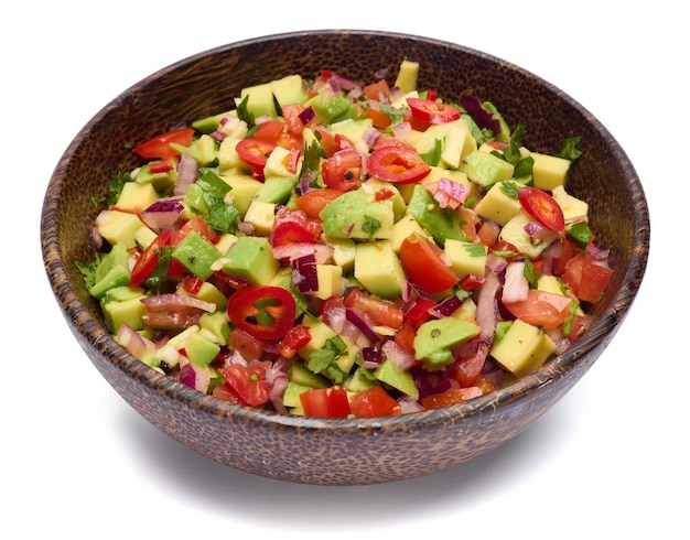 Traditional salsa dip snack in wooden bowl isolated