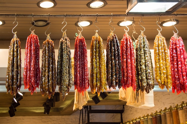 Traditional sausageshaped candies with walnut in it