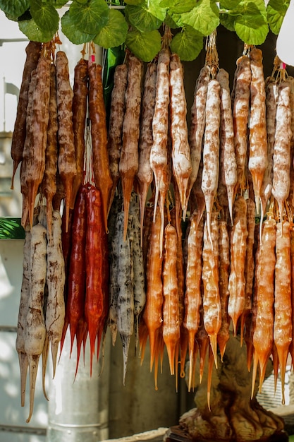 Traditional sausageshaped candies with walnut in it