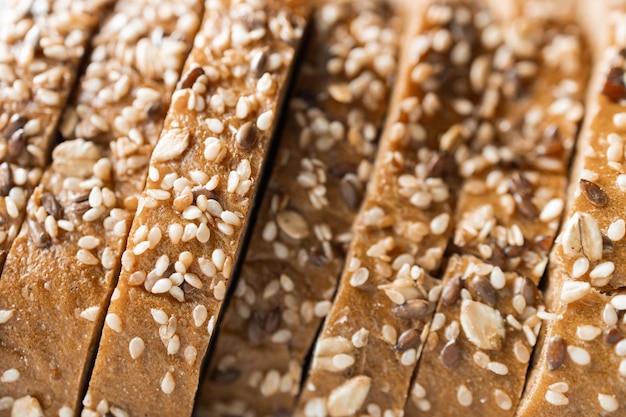 Traditional sourdough bread sliced smeared with butter baked