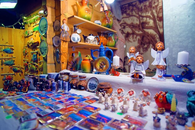 Traditional souvenirs displayed for sale at the european Christmas market. Old Town of Riga, Latvia